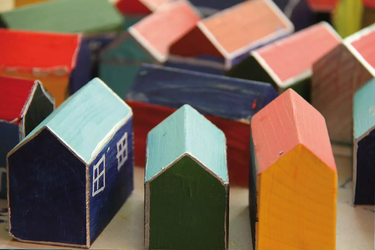 Holzhäuschen als Häusersymbol